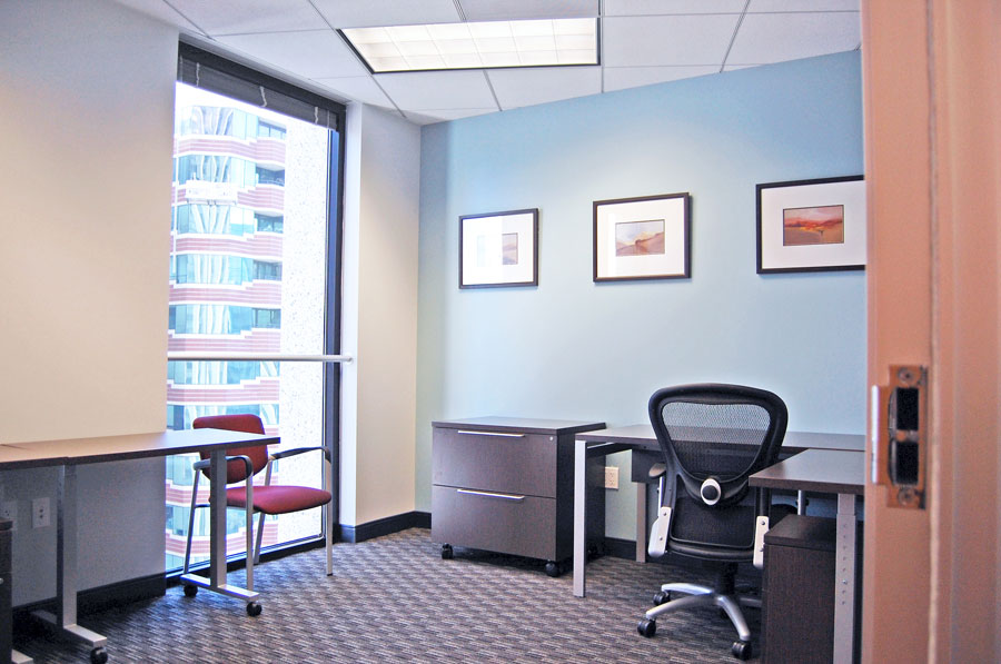 Regus' has small co-op kitchens and pantries through out their business centers for tenants.